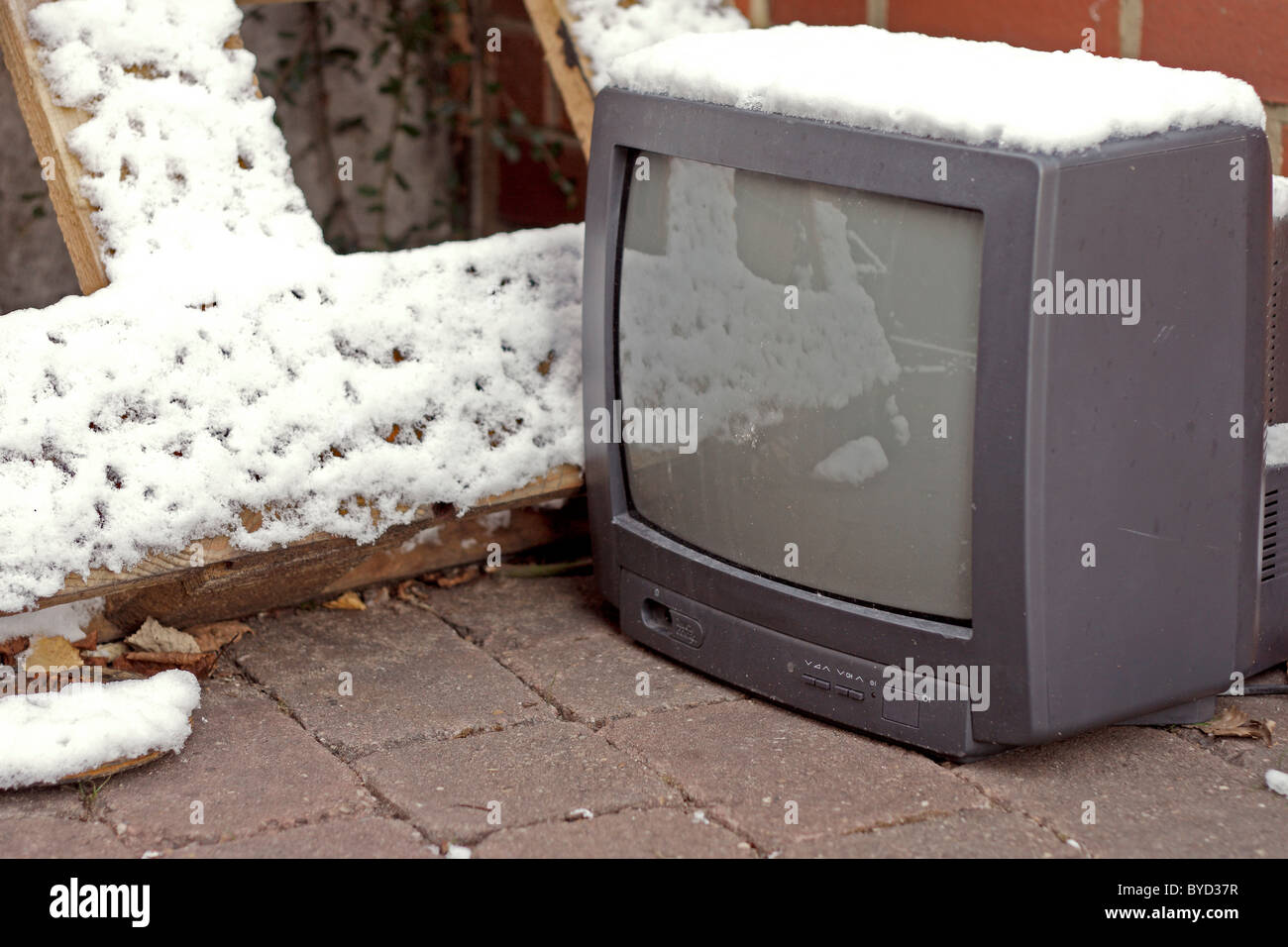 A man using a portable media player; mini T.V; television Miniture TV Stock  Photo - Alamy