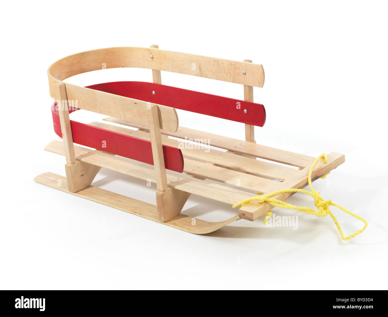 Wooden baby sled, sleigh isolated on white background Stock Photo