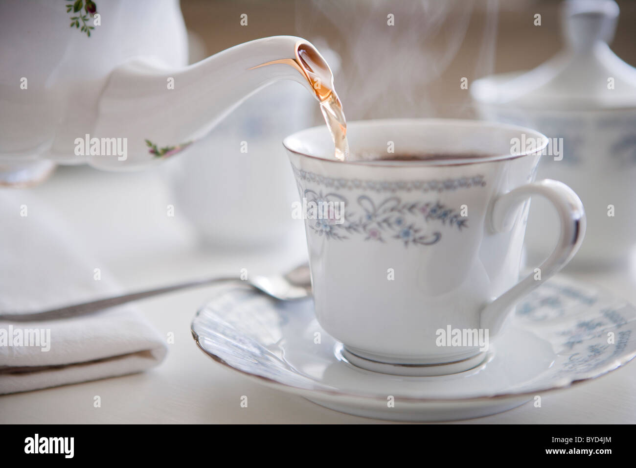 Steaming cup of tea in fine china Stock Photo