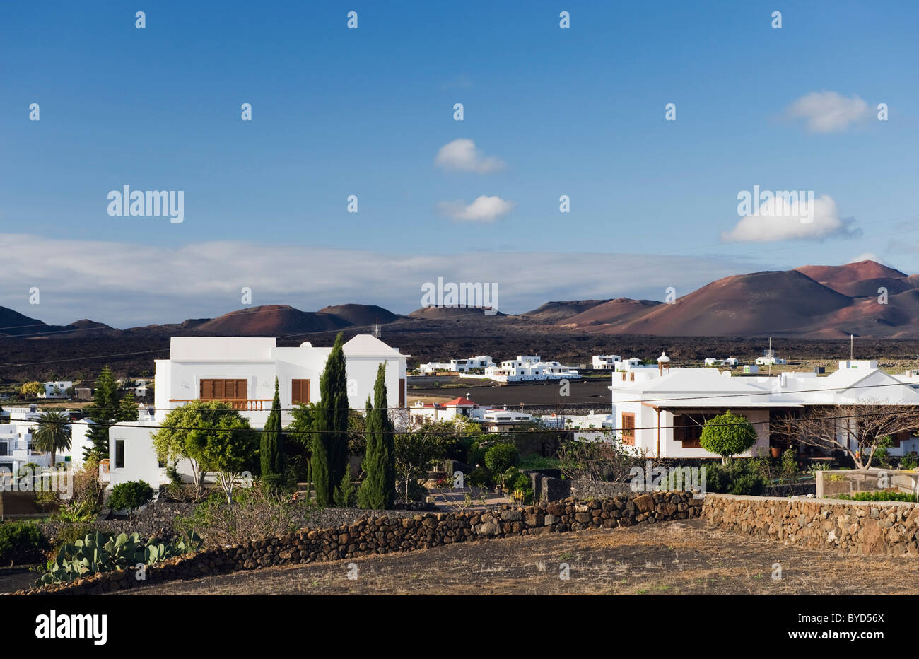 White town in a volcanic landscape, Yaiza, Lanzarote, Canary Islands, Spain, Europe Stock Photo