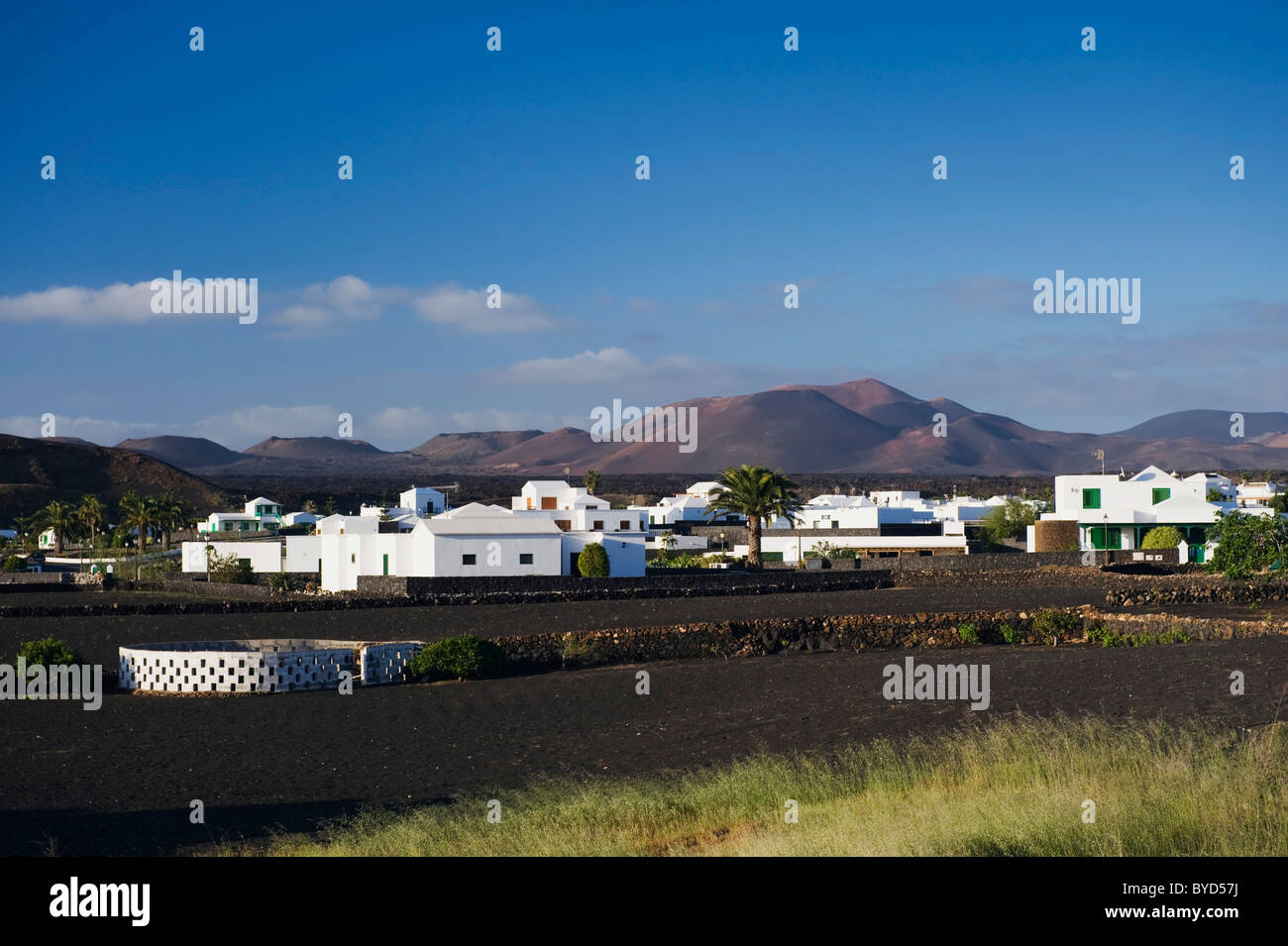 White town in a volcanic landscape, Yaiza, Lanzarote, Canary Islands, Spain, Europe Stock Photo