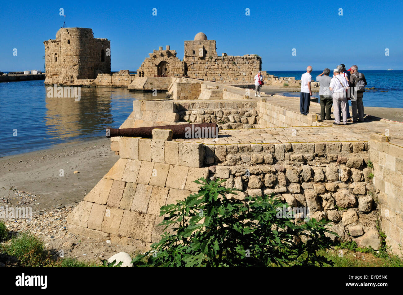Tourists at the historic Crusader castle at Sidon, Saida, Lebanon
