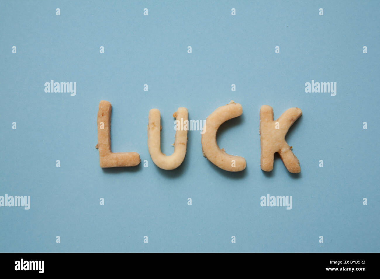 Luck, word written with biscuits Stock Photo