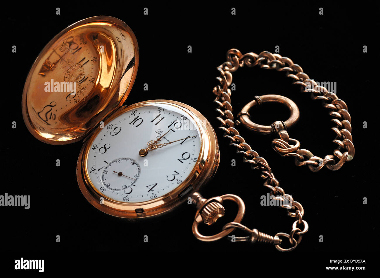 Longines gold plated pocket watch with chain, five to twelve, 19th century Stock Photo