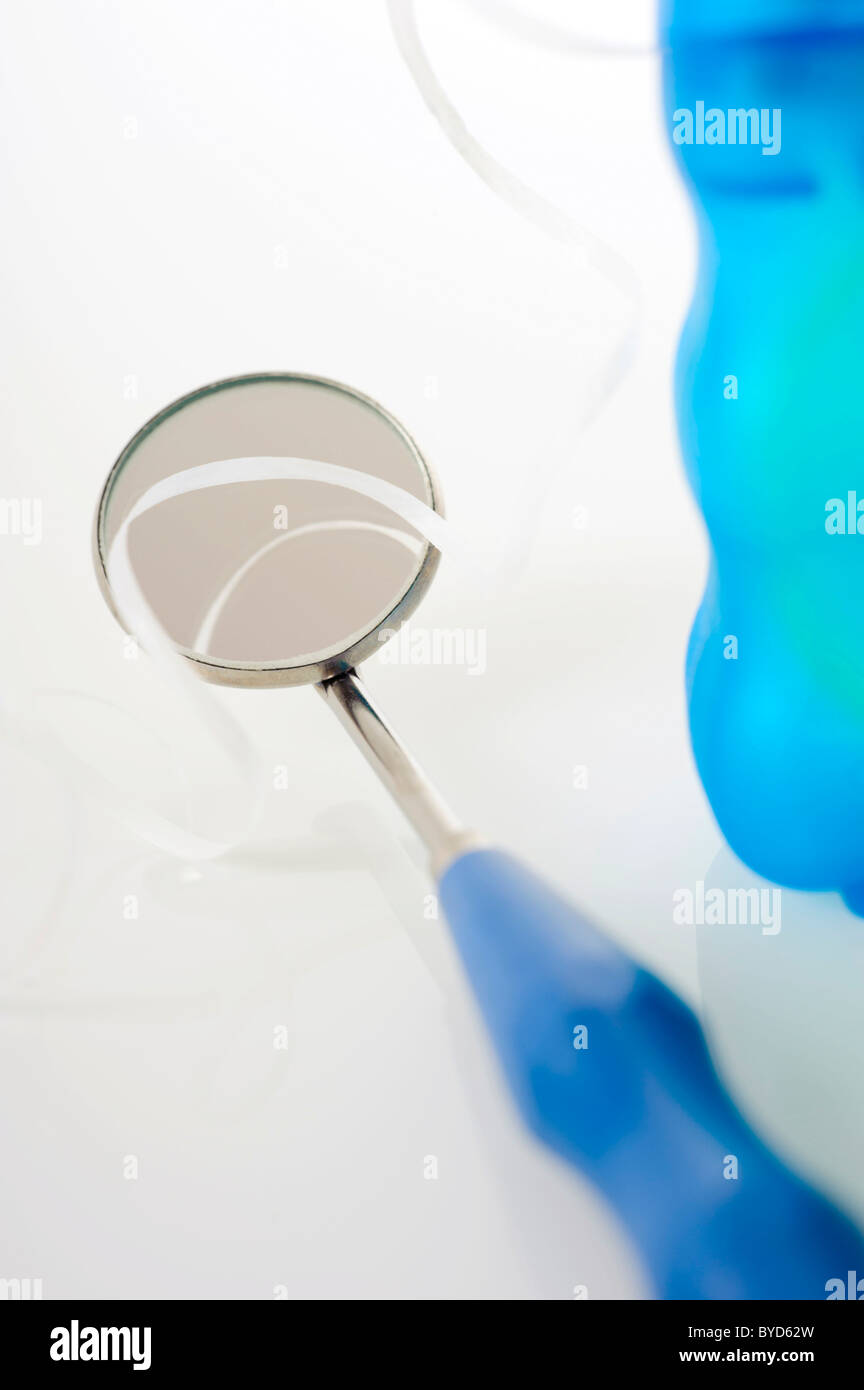Dental hygiene, dental floss and a dental mirror Stock Photo Alamy