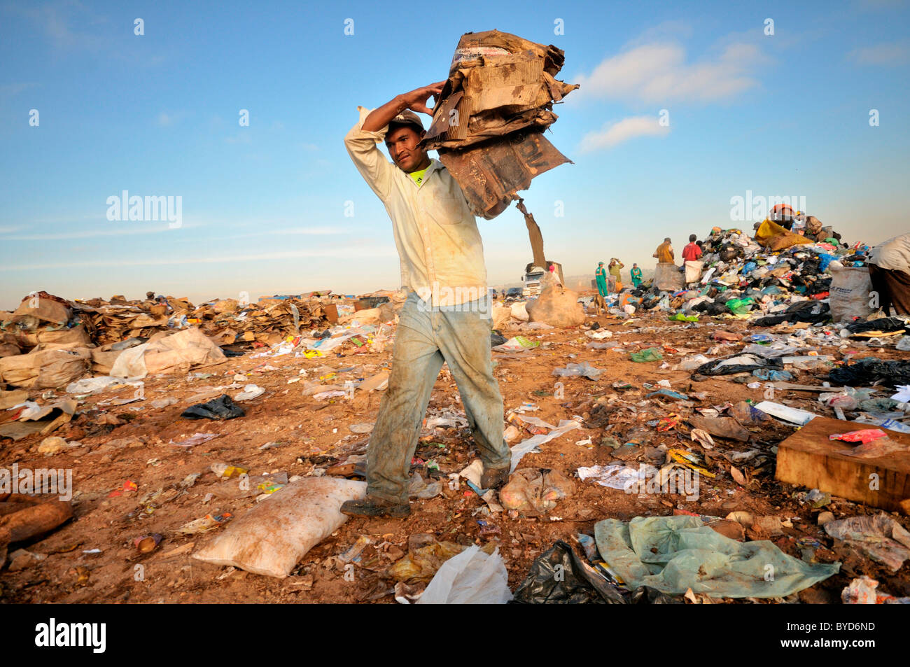 Man lives by searching for recyclables and waste paper at Lixao dump in the satellite city of Estrutural near Brasilia Stock Photo