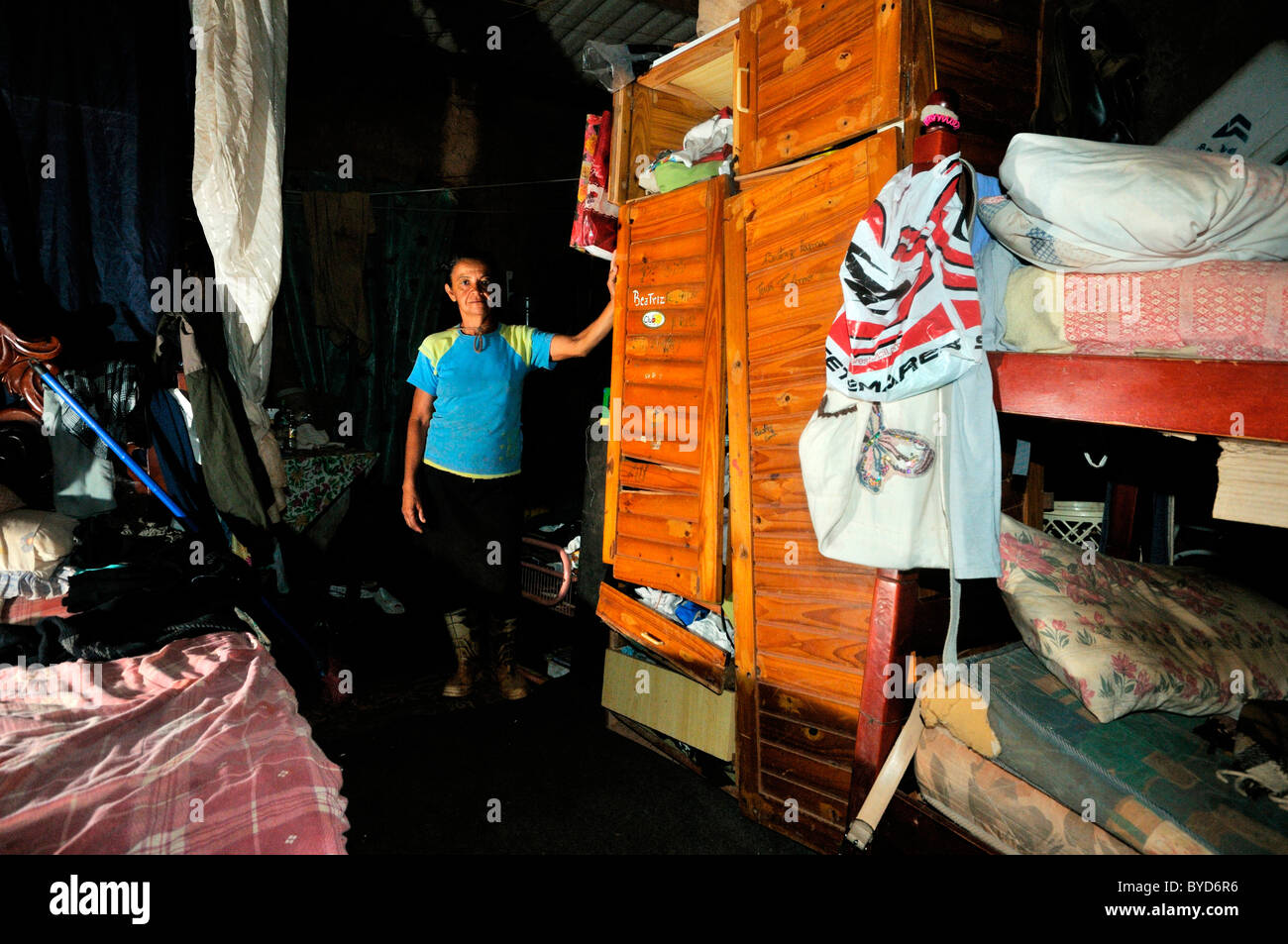 Garbage collector in her rudimentary home at Lixao dump in the satellite city of Estrutural near Brasilia, Distrito Federal Stock Photo