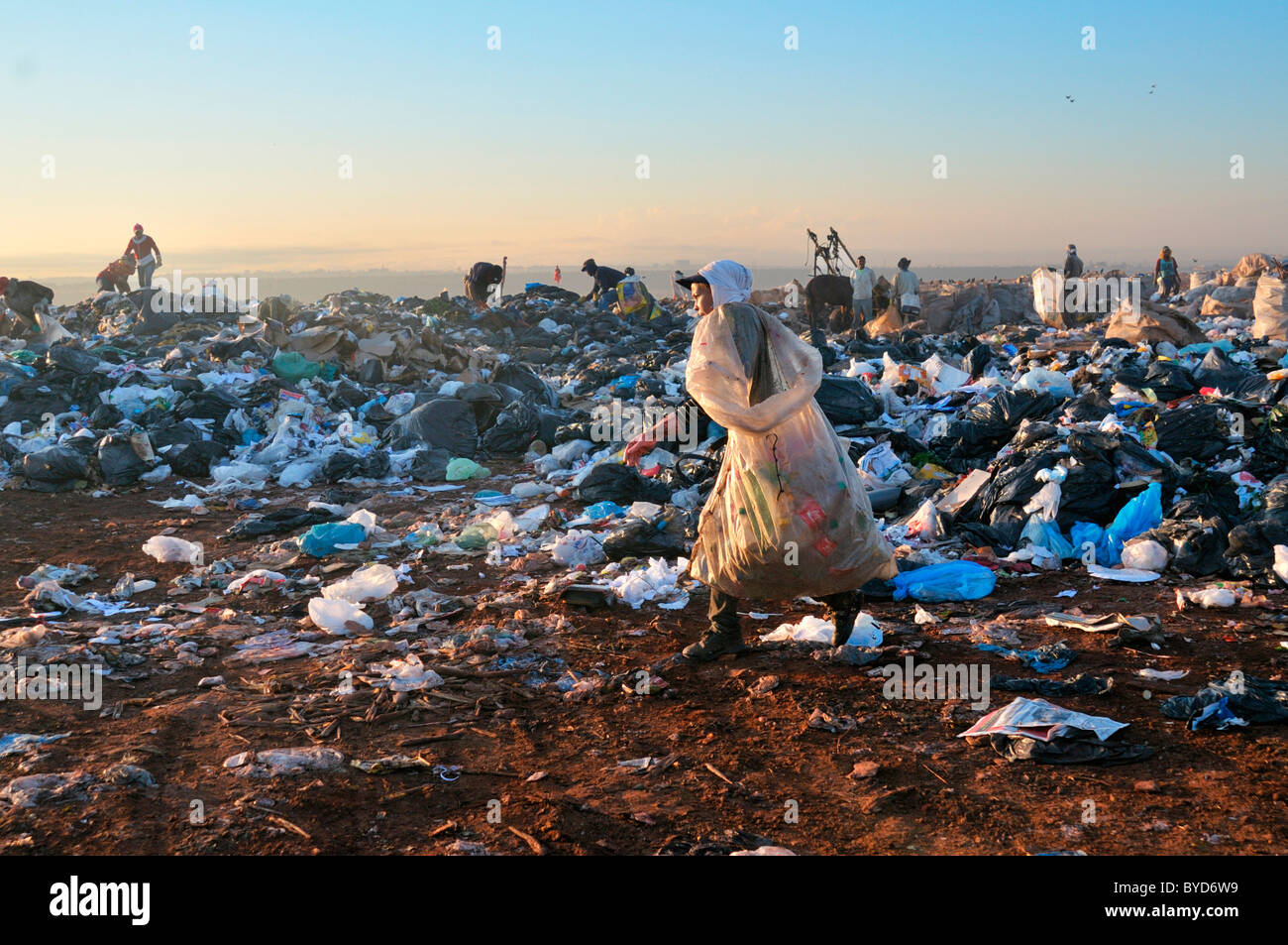 Young woman lives by looking for recyclables at the Lixao dump in the satellite city of Estrutural near Brasilia Stock Photo