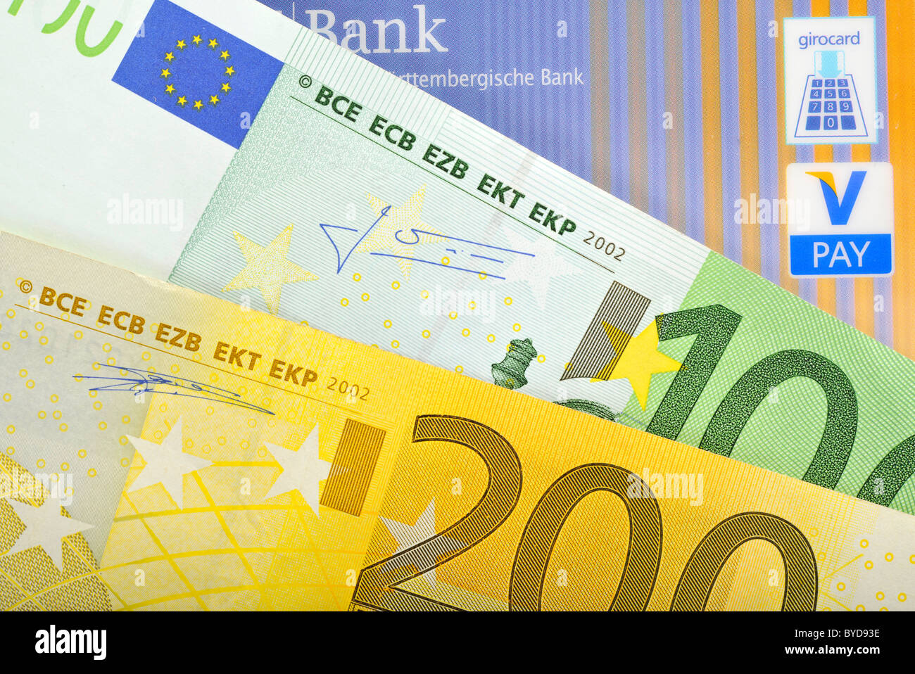 Euro banknotes, bills fanned out, bank card, cash card with the latest icons, V-PAY, VPAY, girocard Stock Photo