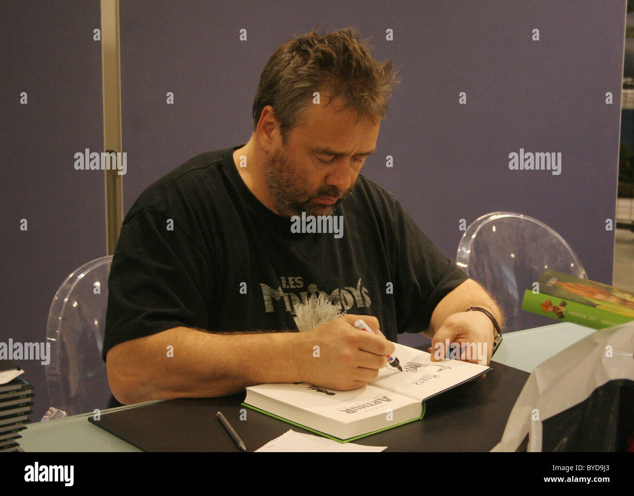 Luc Besson signing his book