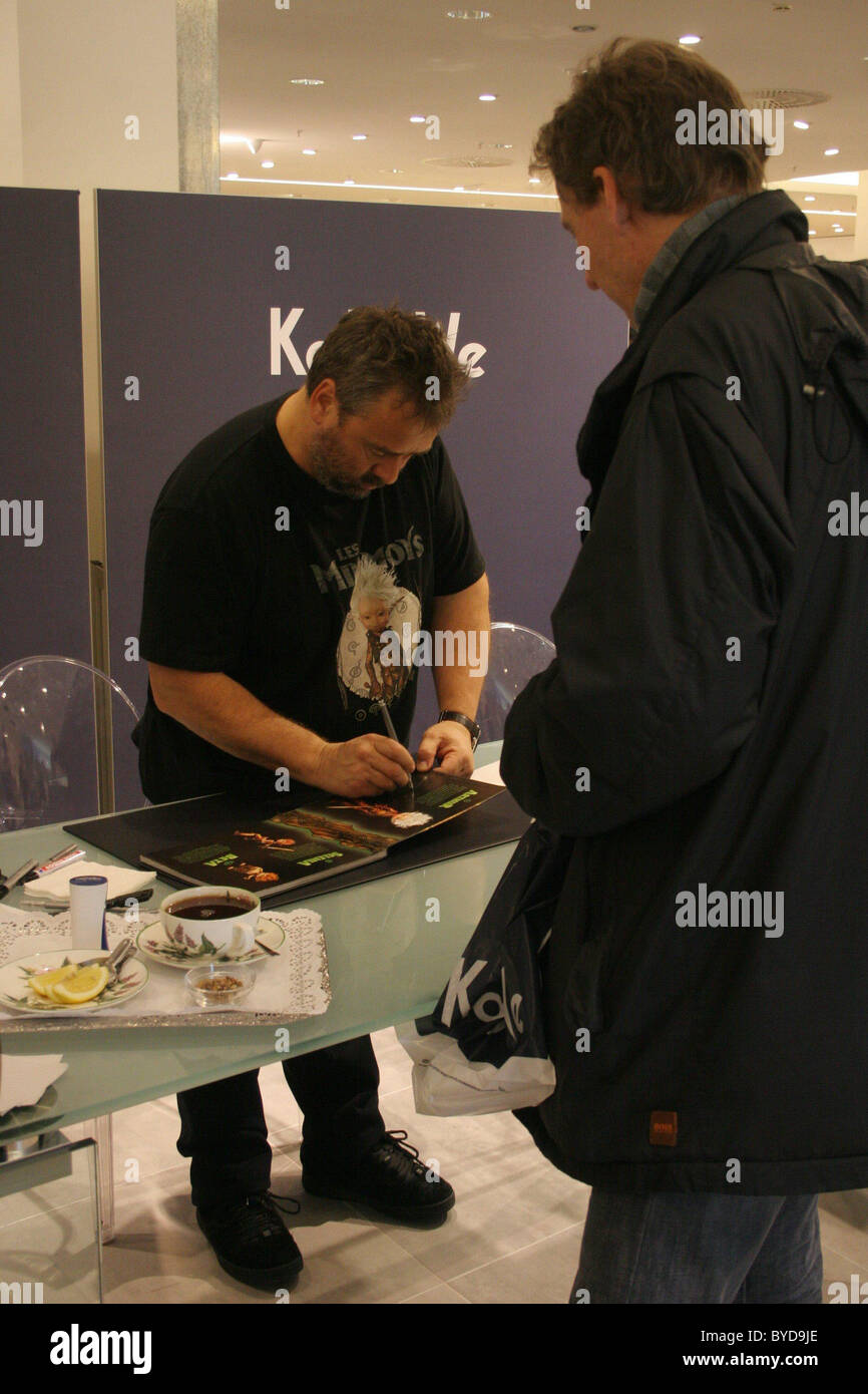 Luc Besson signing his book