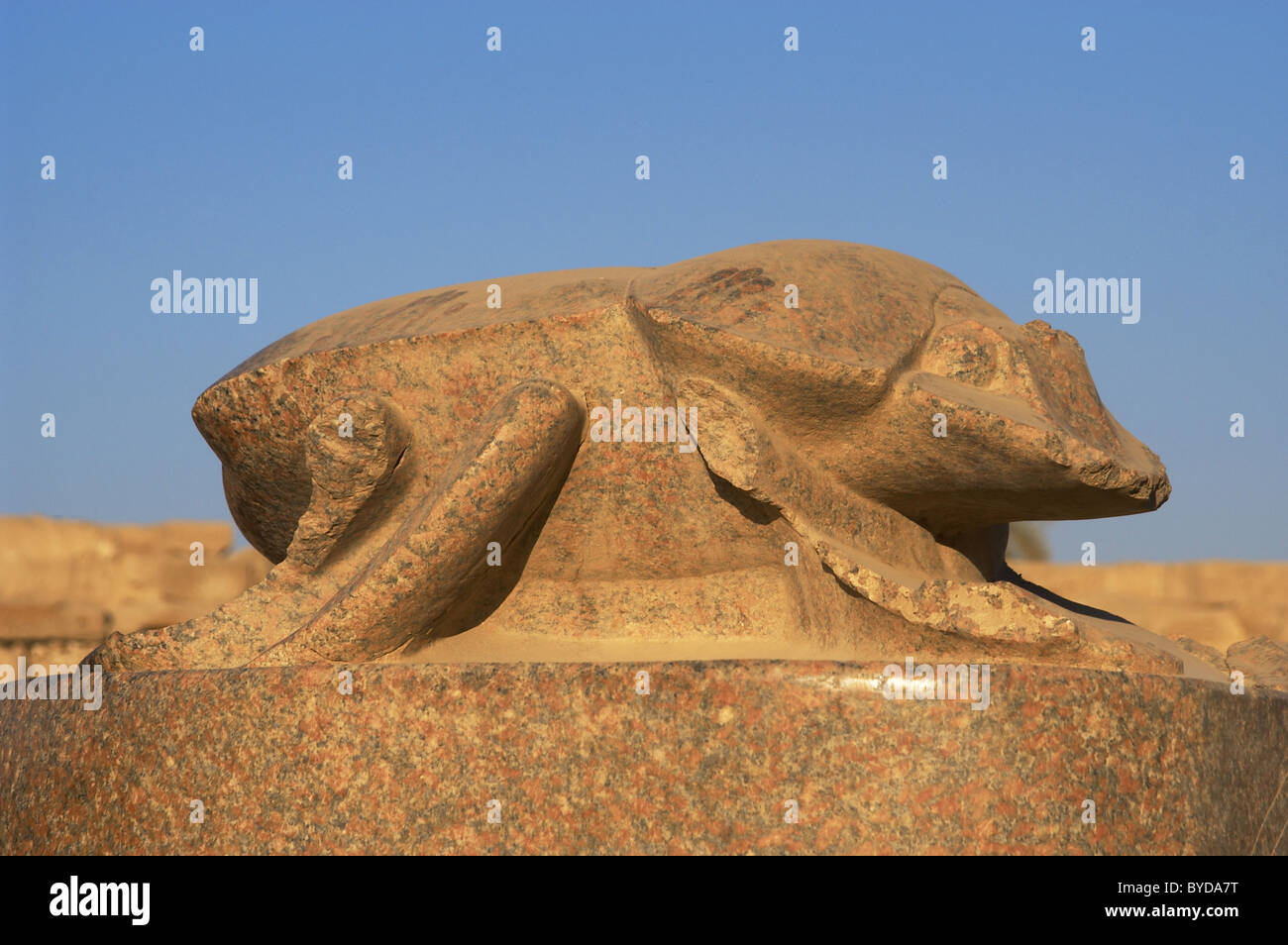 Egyptian Art. Sacred beetle. Giant statue. Represents Khepri, god of sunrise. Sacred Lake. Temple of Karnak. Egypt. Stock Photo
