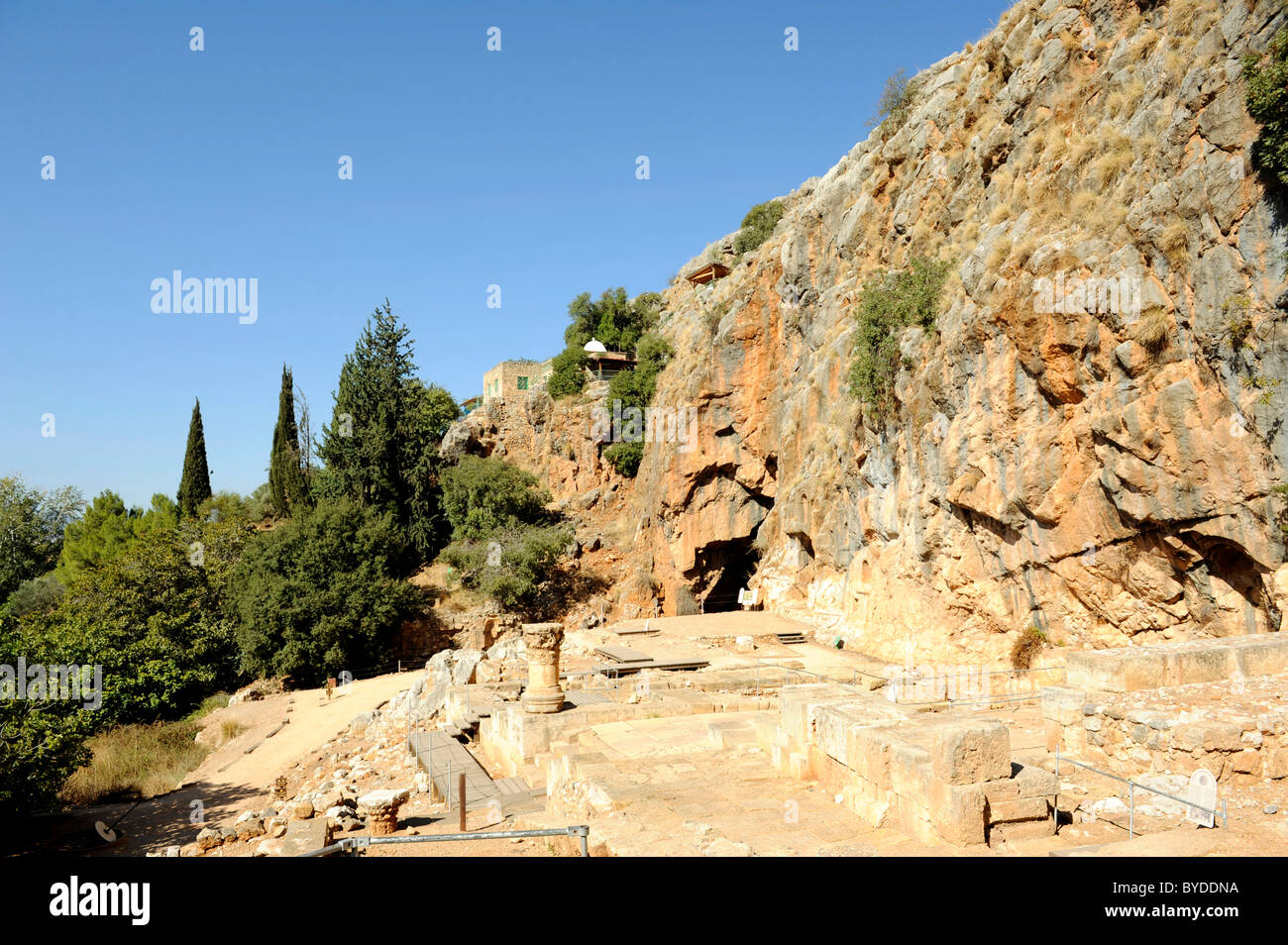 Temple of Pan with Pan's grotto, above in the center shrine of Nebi Khader, religious figure for Druze and Muslims Stock Photo