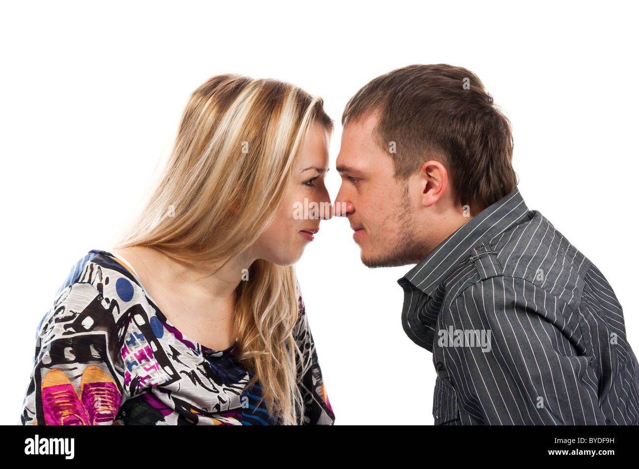 Portrait of a beautiful young happy couple isolated on white Stock ...