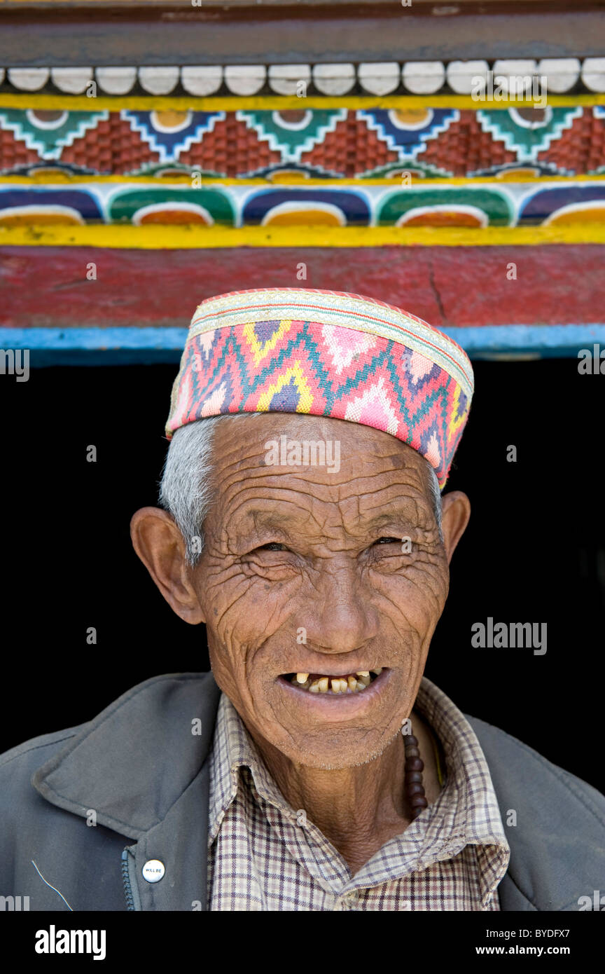 Old man wearing a colorful hat, portrait, Tibetan Buddhism, Shashur Gompa, Keylong, Lahaul and Spiti district, Himachal Pradesh Stock Photo