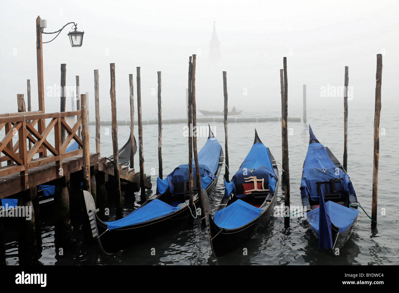 Gondolas in the fog at St. Mark's Square, Venice, Veneto, Italy, Europe Stock Photo