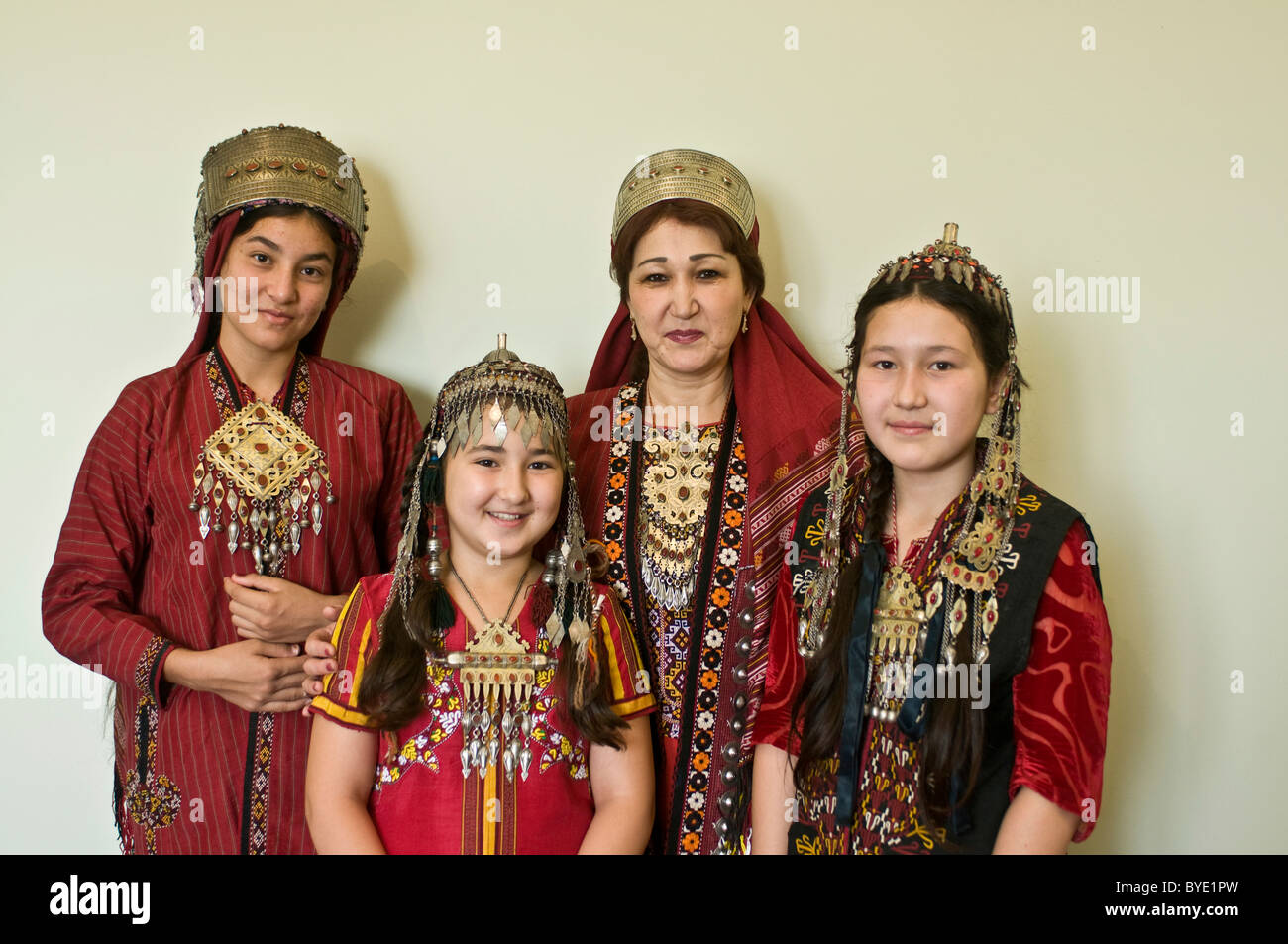 Group picture of Turkmen family in traditional costume, Turkmenistan, Central Asia Stock Photo