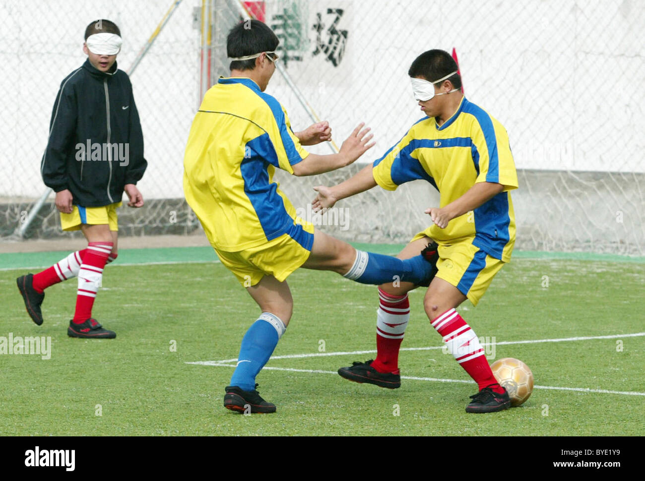 BLIND FOOTBALL This football team is made up of blind boys who play with a special ball in which