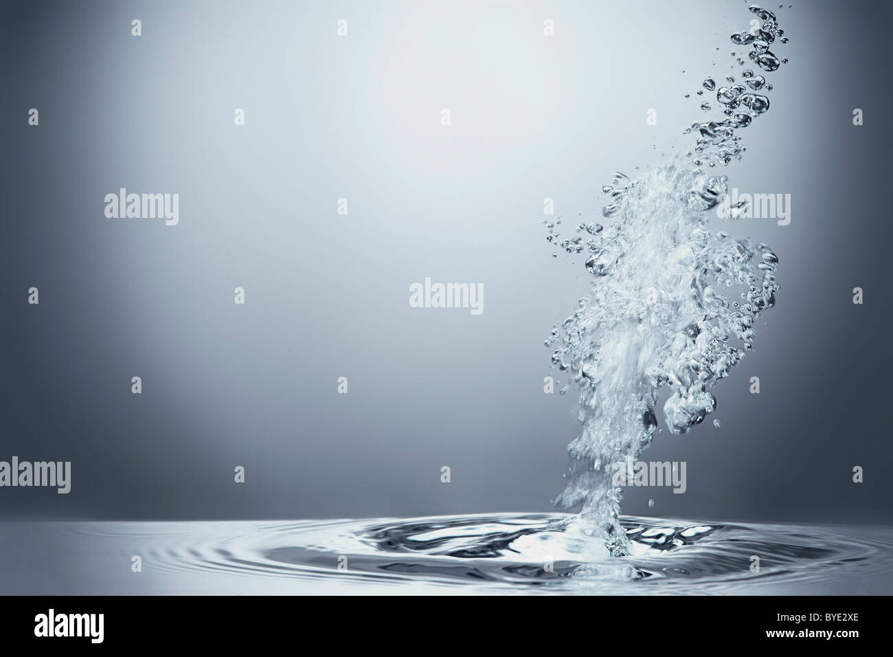 Air bubbles bubbling in water Stock Photo