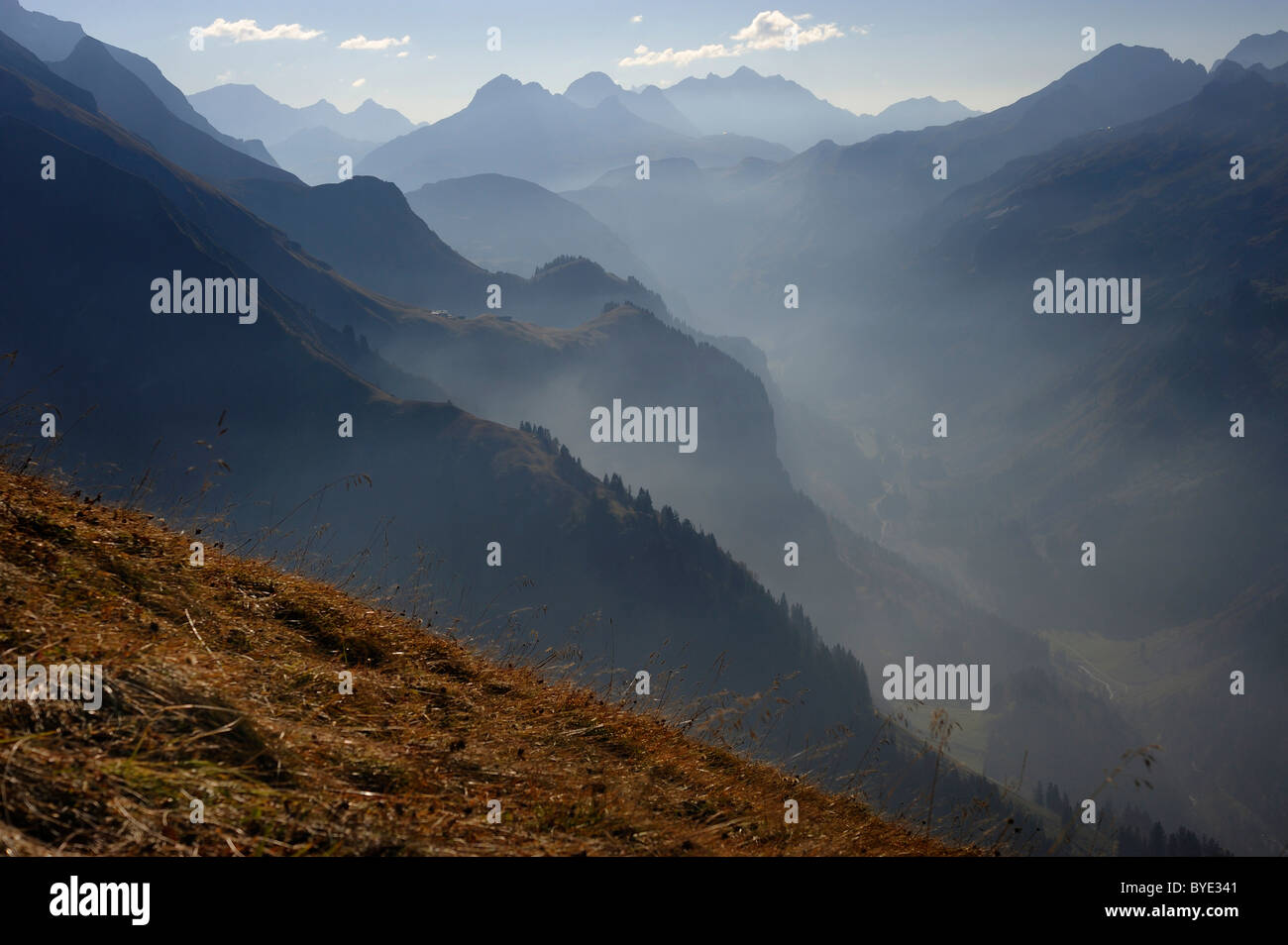 Mountain valley with haze, Allgaeu Alps, Kleinwalsertal valley, Vorarlberg, Austria, Europe Stock Photo
