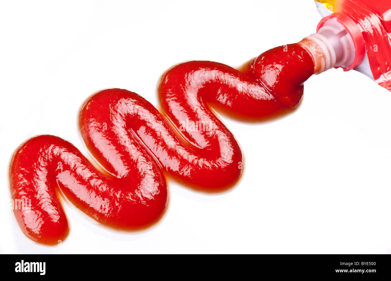 Portion of ketchup isolated on a white background. Stock Photo
