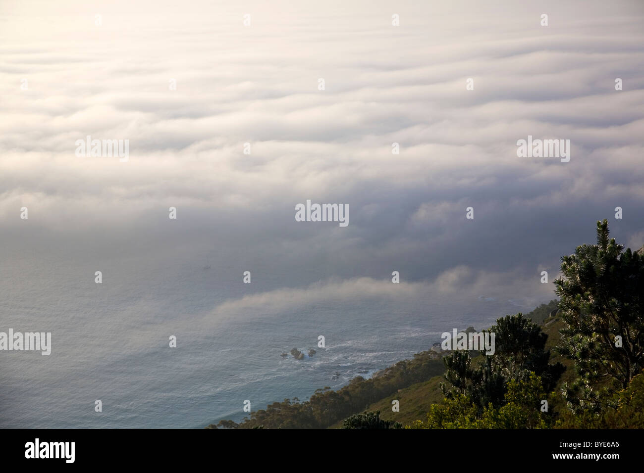 Fog coming onto shore in cape Town as viewed from Lions Head Stock Photo