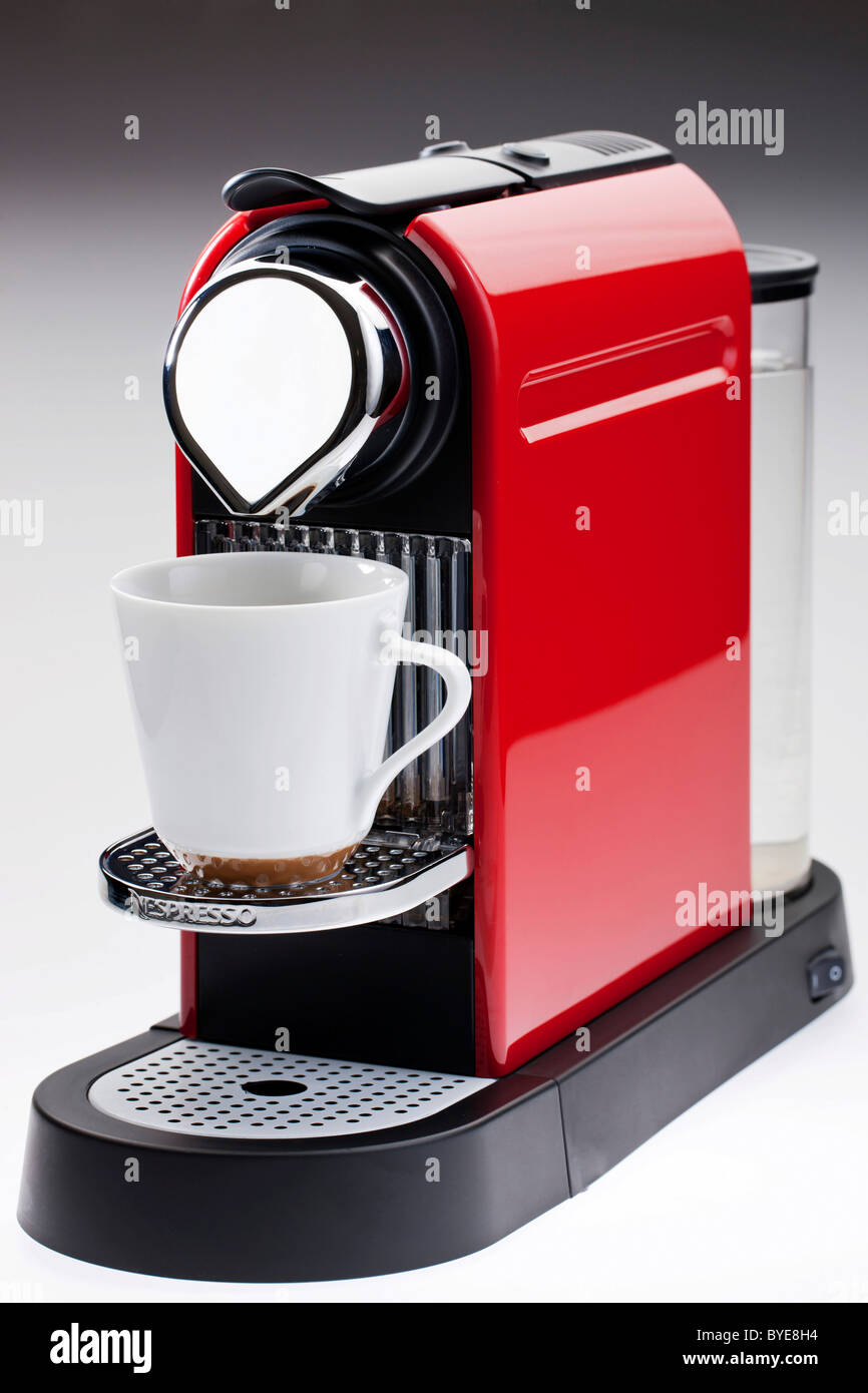Red coffee machine Stock Photo - Alamy