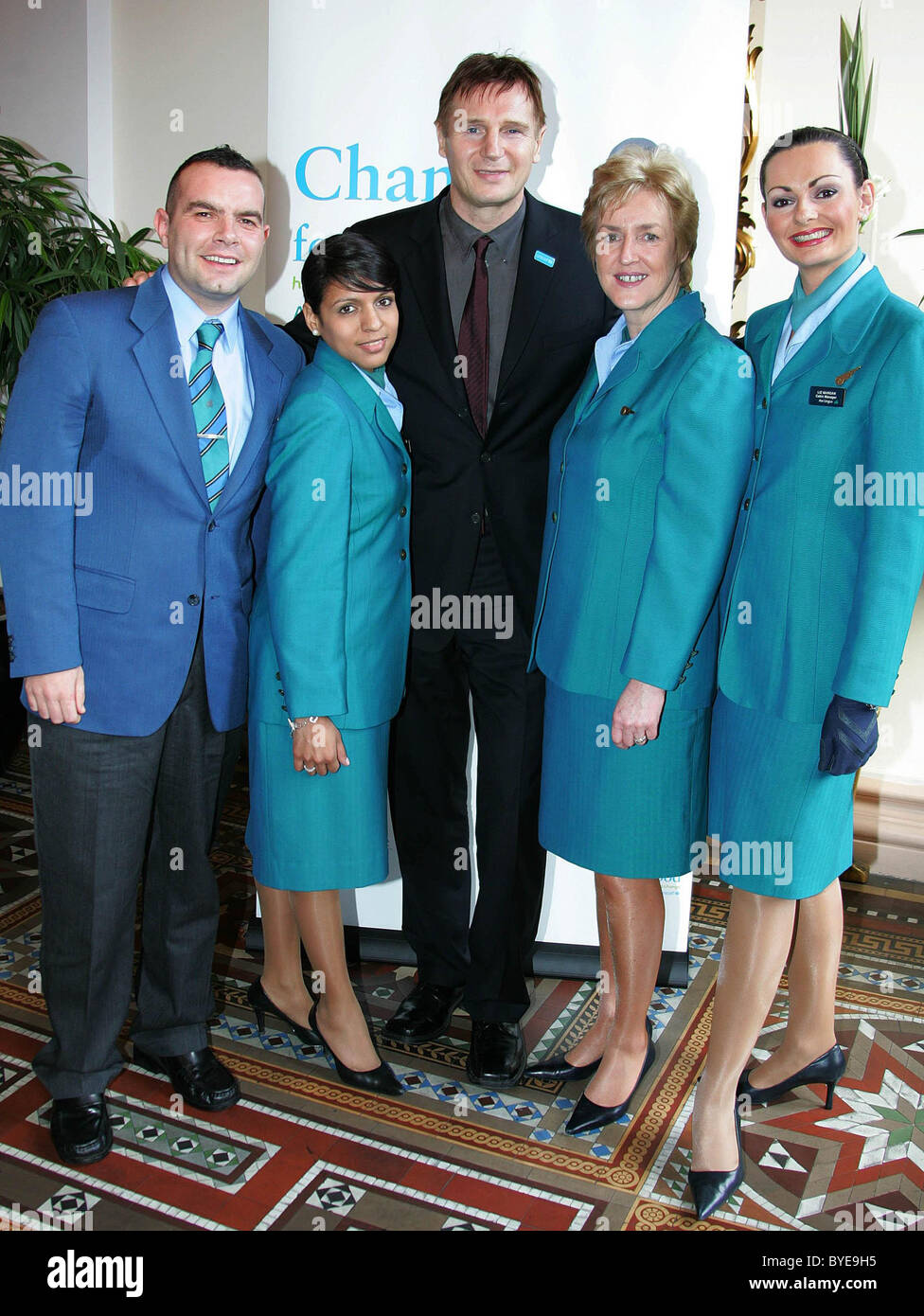 Actor and UNICEF Ireland Ambassador Liam Neeson with Aer Lingus staff in the Westin Hotel Dublin to mark the tenth anniversary Stock Photo