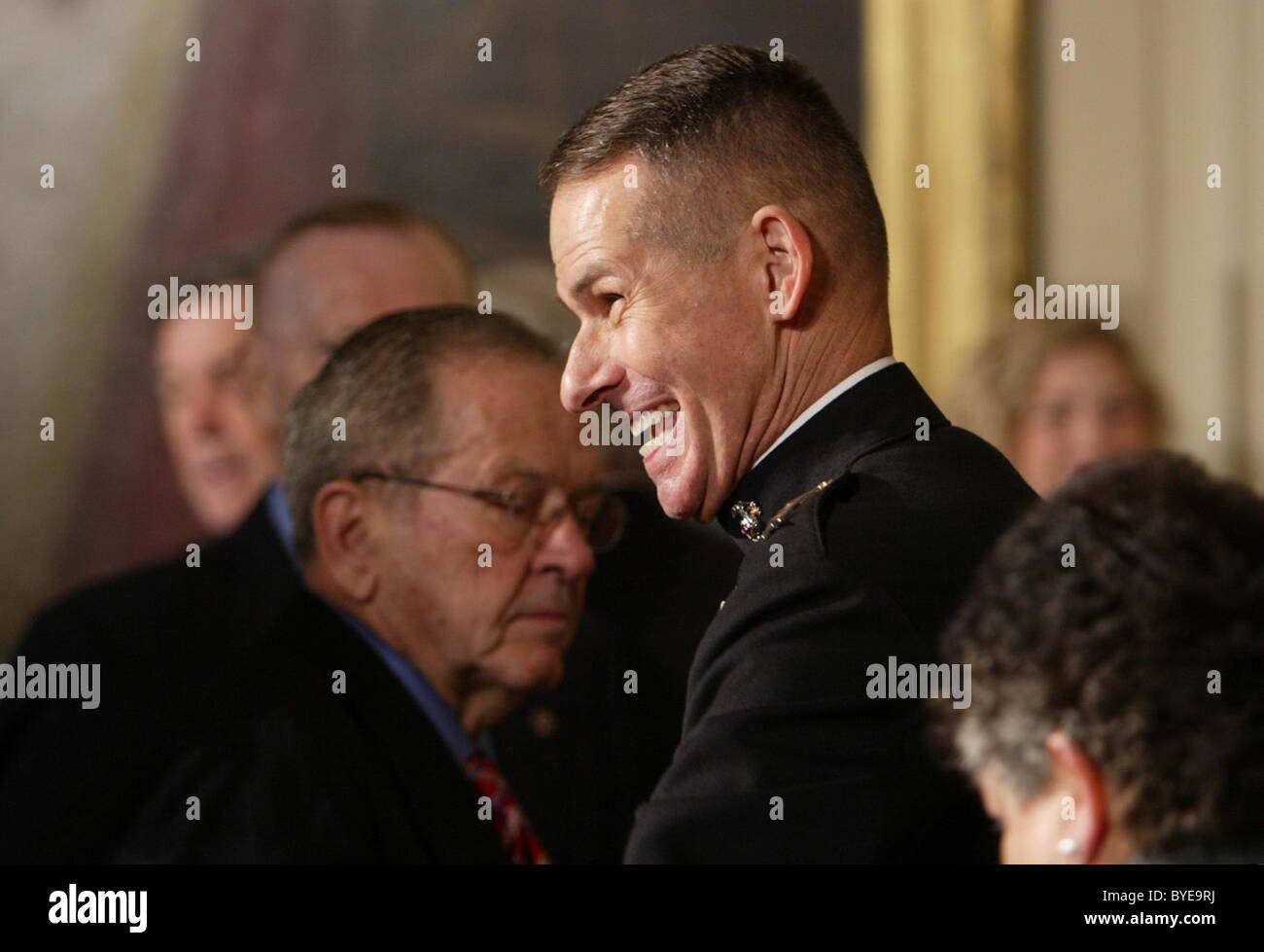 General Peter Pace President George W. Bush sheds a tear while presenting a posthumous Medal of Honor to the family of Corporal Stock Photo