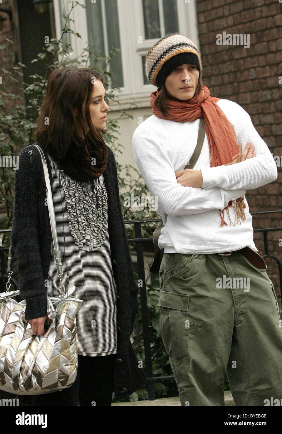 Keira Knightley and boyfriend Rupert Friend stop to pose for the papparazzi in the hope they will leave them in peace. When Stock Photo