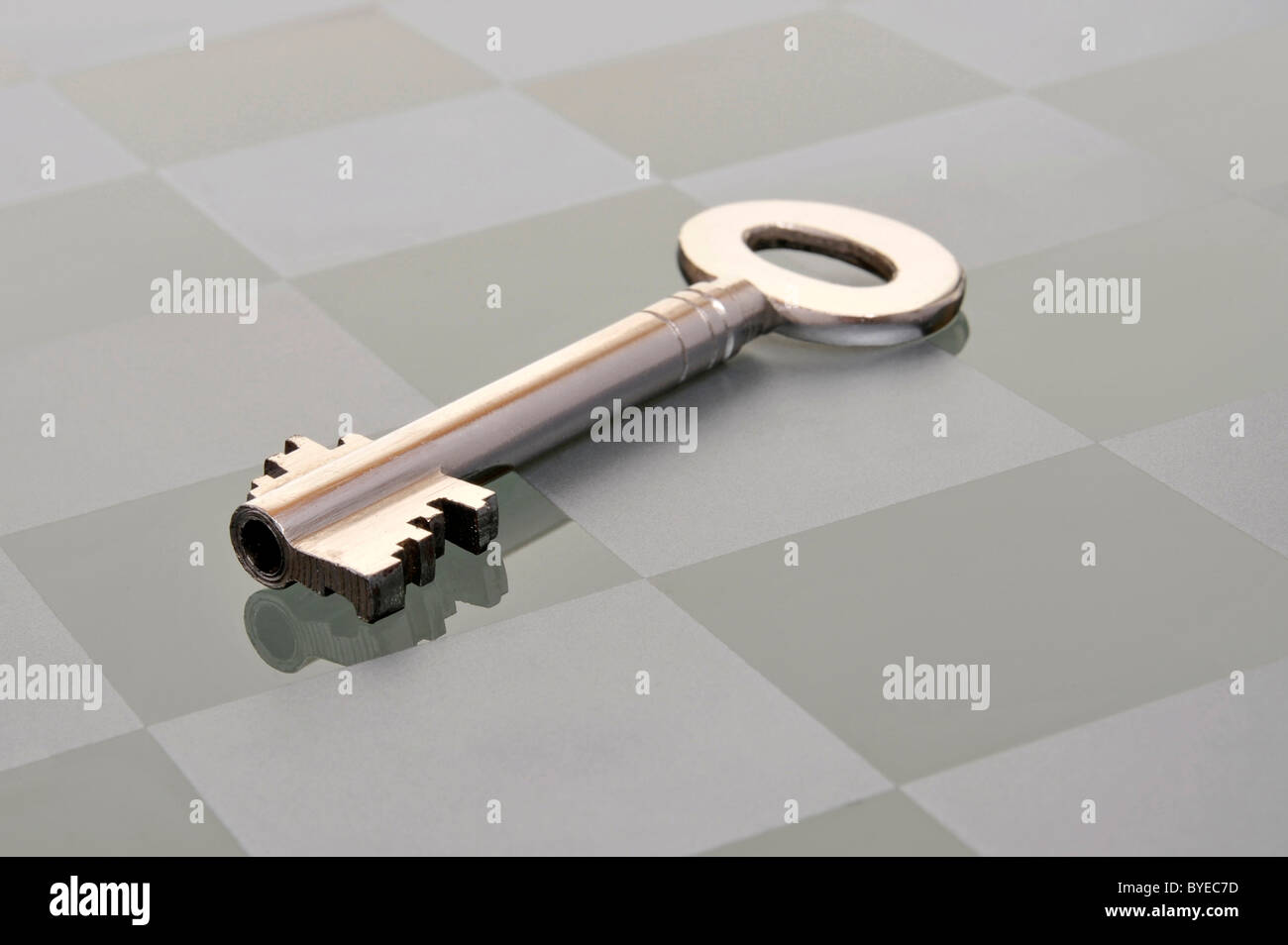 Key For A Safe On A Chessboard Stock Photo Alamy