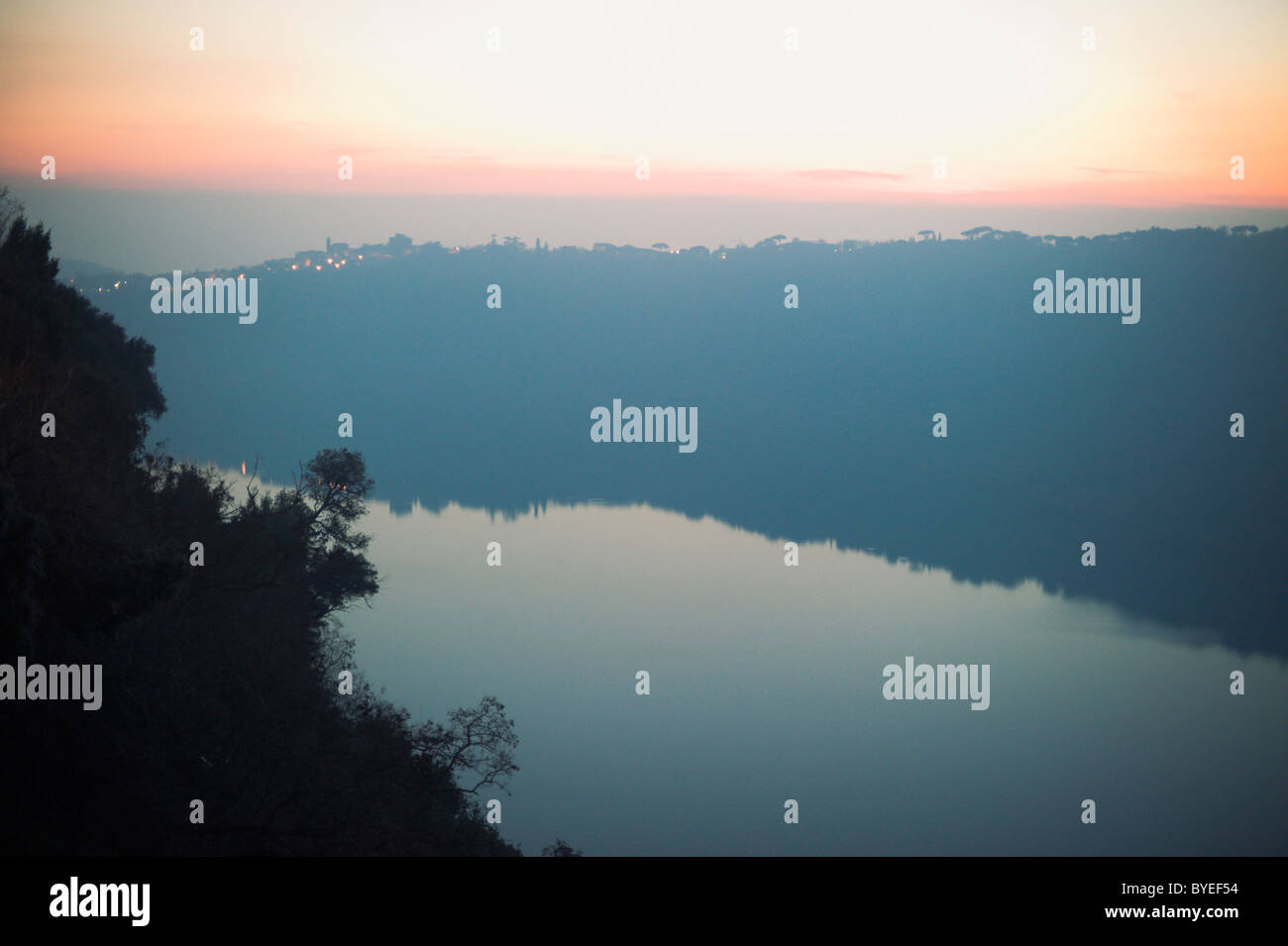 Lake Nemi view towards Genzano town, after sunset, as seen from Nemi town Stock Photo