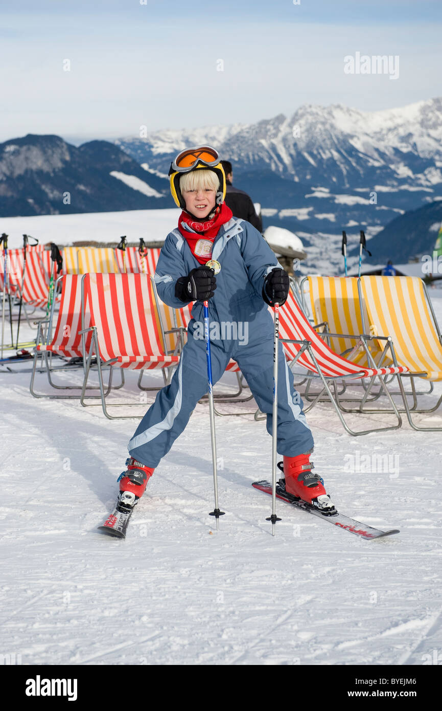 Young boy enjoys skiing on the Markbachjoch in Niederau in Austria Stock Photo