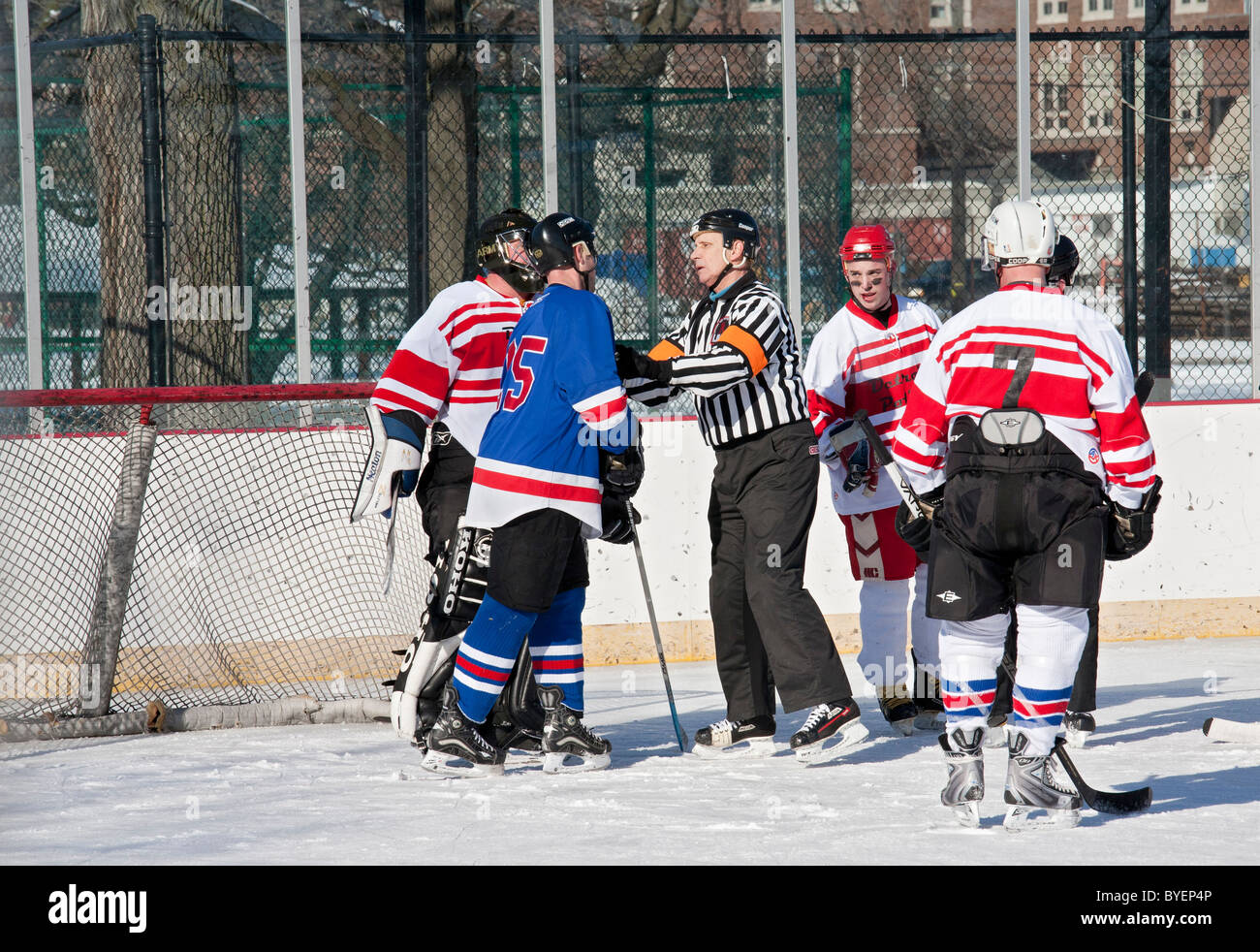 Detroit Policemen Play Detroit Firefighters in Charity Ice Hockey Game Stock Photo