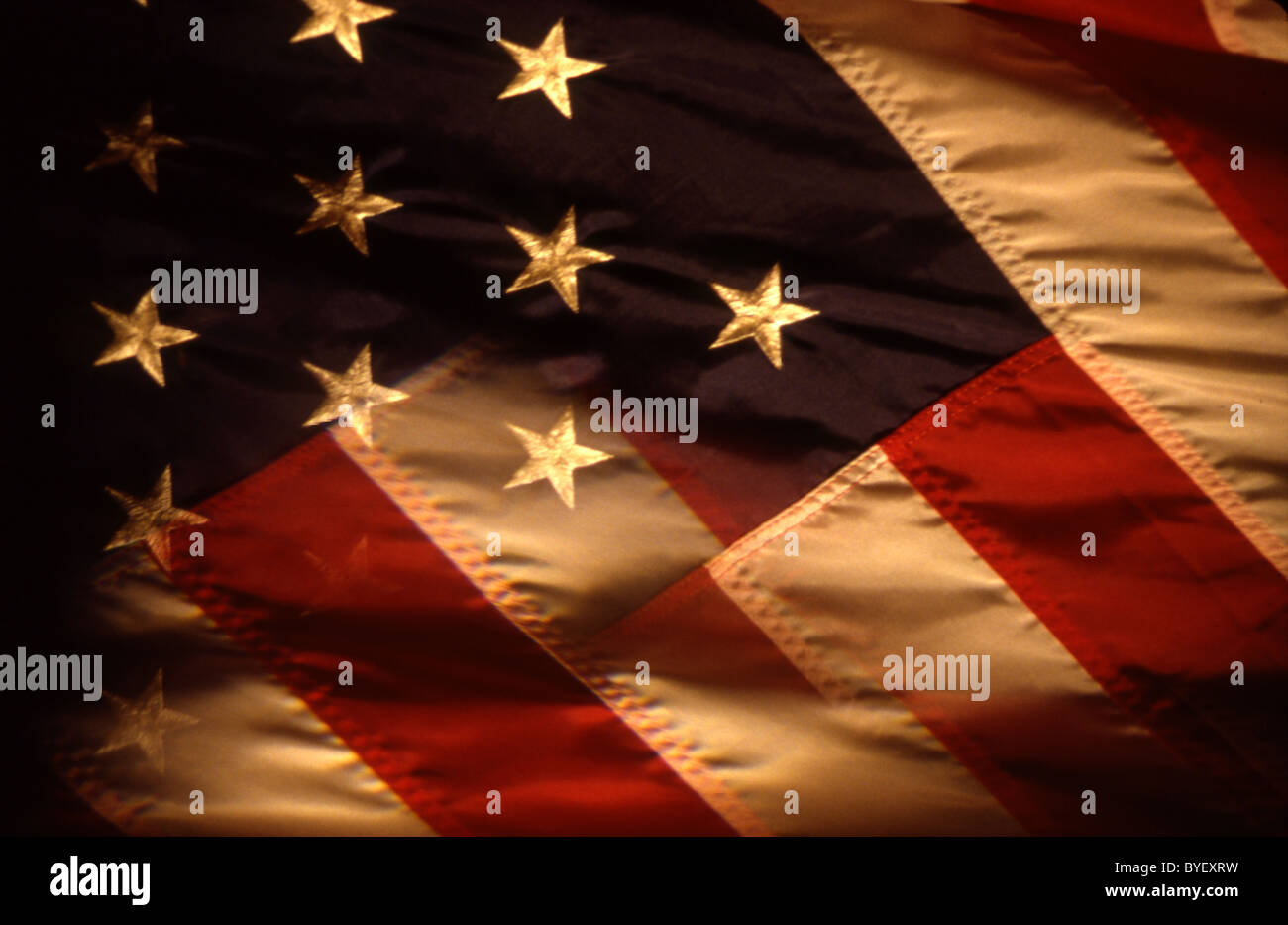 an american flag with one of the stars bleeding into the stripes Stock Photo