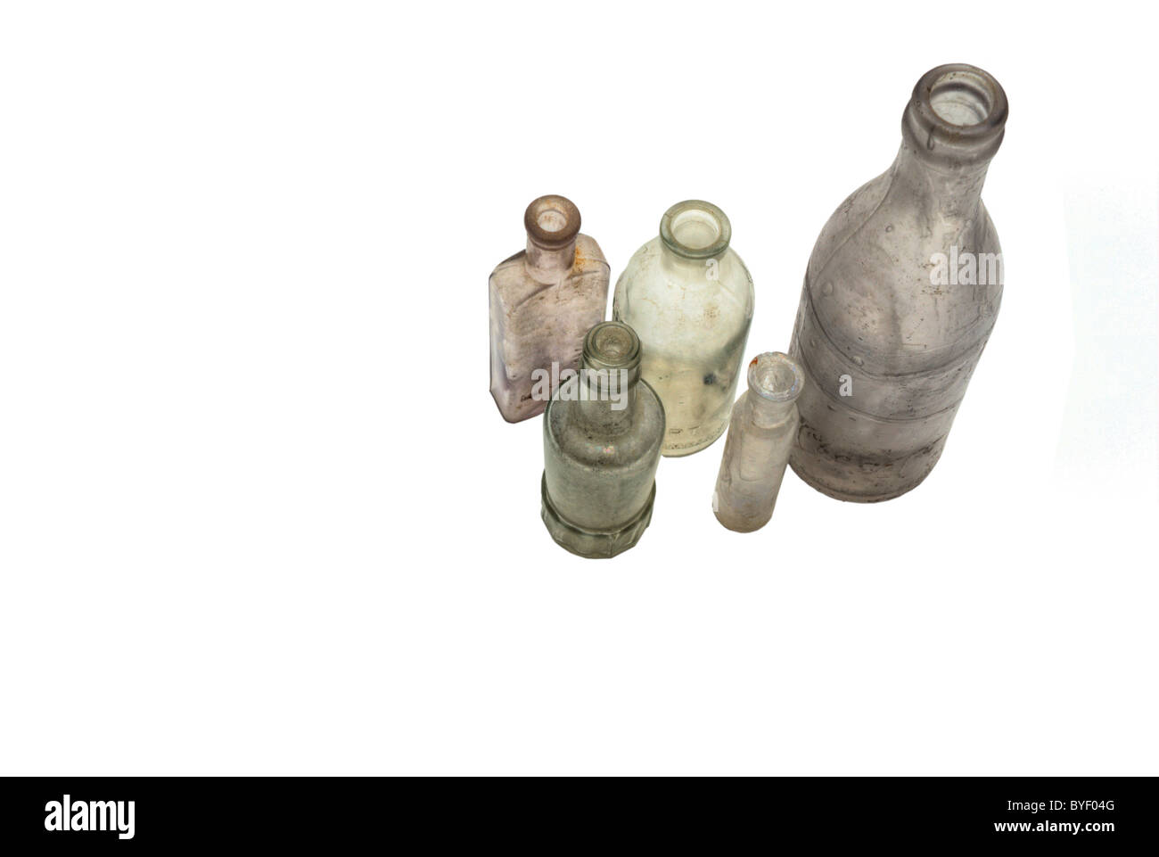Vintage glass bottles isolated on white with copy space Stock Photo