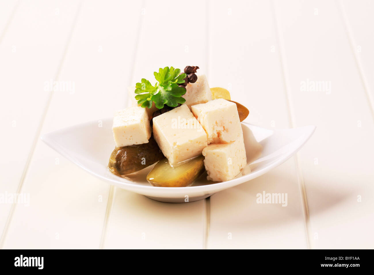 Cubes of marinated feta cheese and pickles Stock Photo Alamy