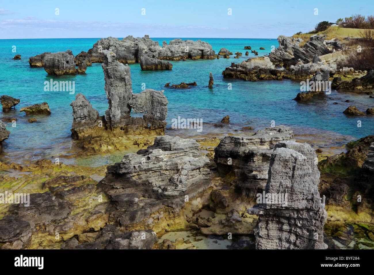 Turquise water and coral rock in St. George, Bermuda Stock Photo