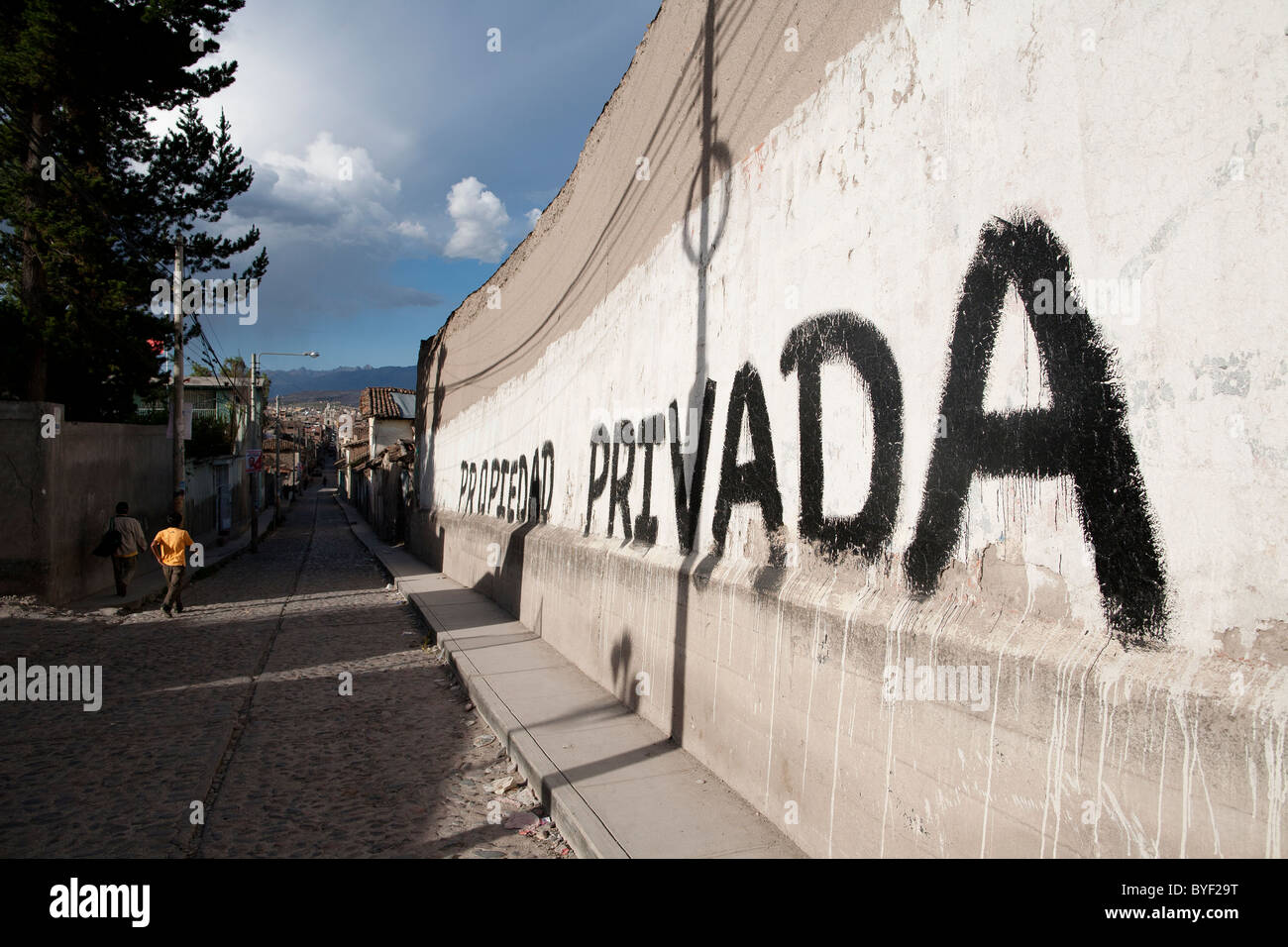 private-property-is-written-in-spansih-on-a-wall-of-convent-in-the-city-of-ayacucho-peru-stock