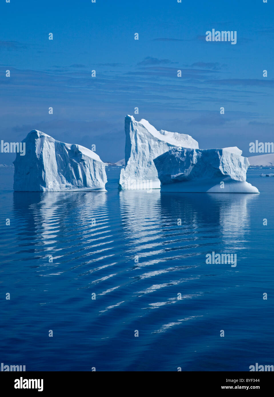 Icebergs in the convergence of the Lemaire Channel and Gerlache Strait, Antarctic Peninsula Stock Photo
