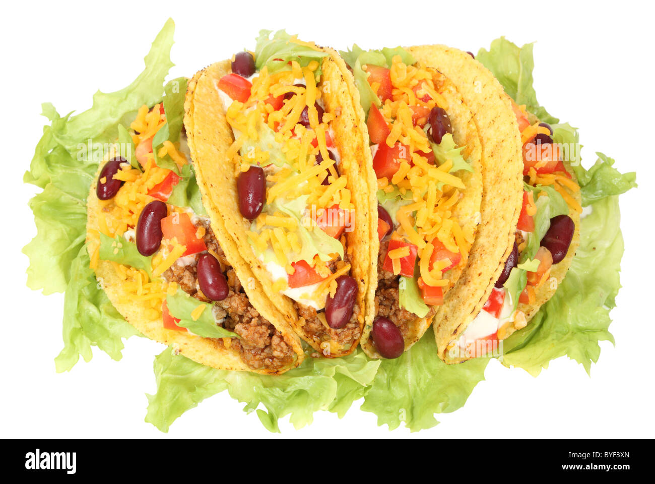 Delicious Mexican tacos isolated over white background Stock Photo