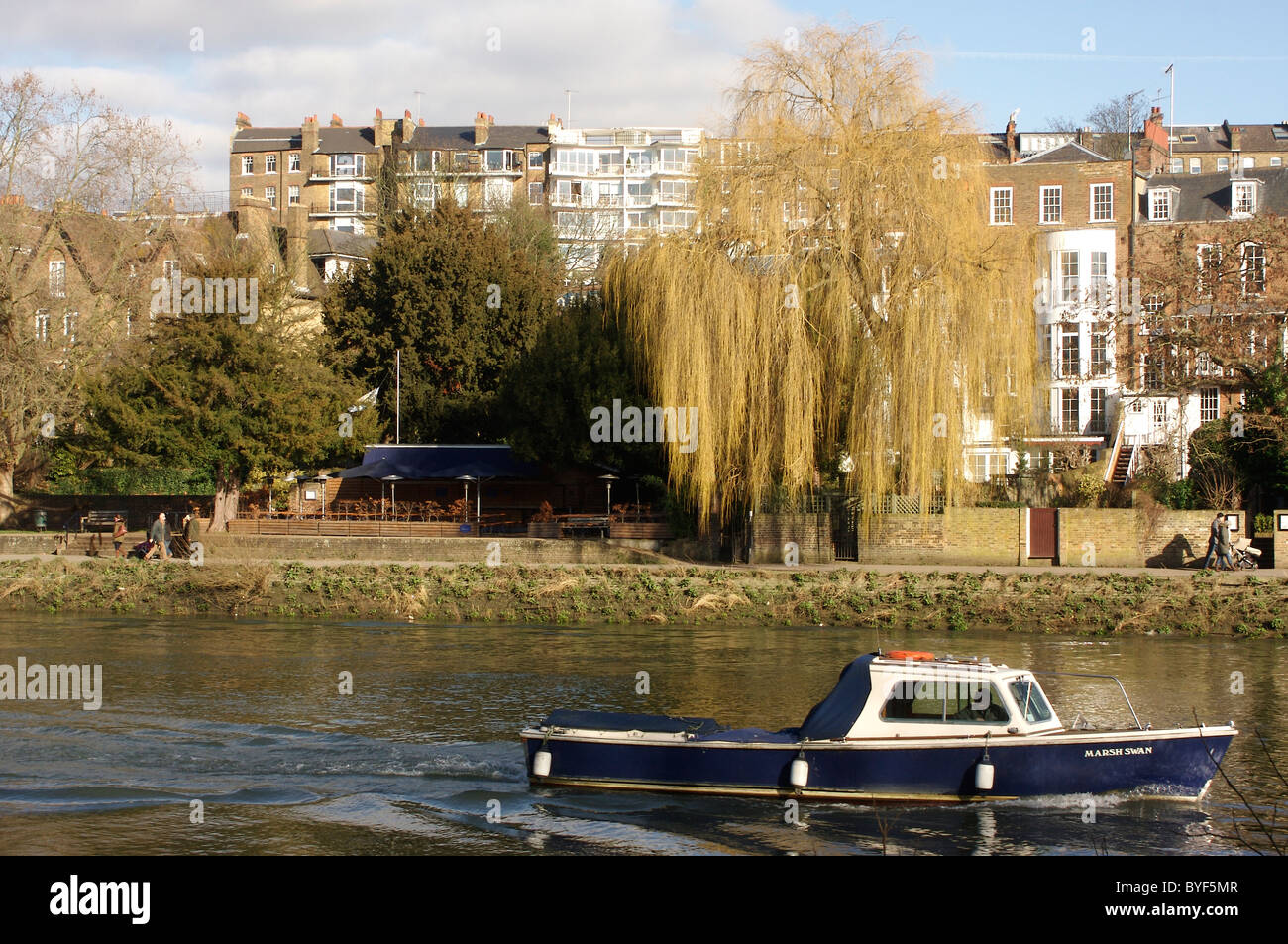 Boat cruising the River Thames near Richmond Upon Thames Stock Photo