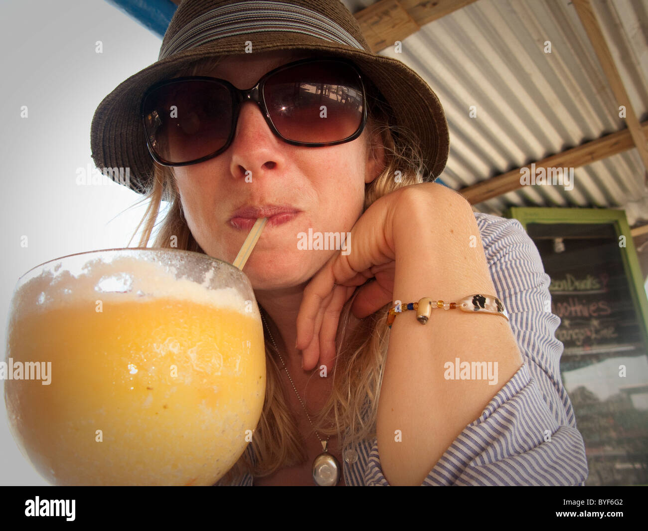 girl drink pina colada on vacation Stock Photo