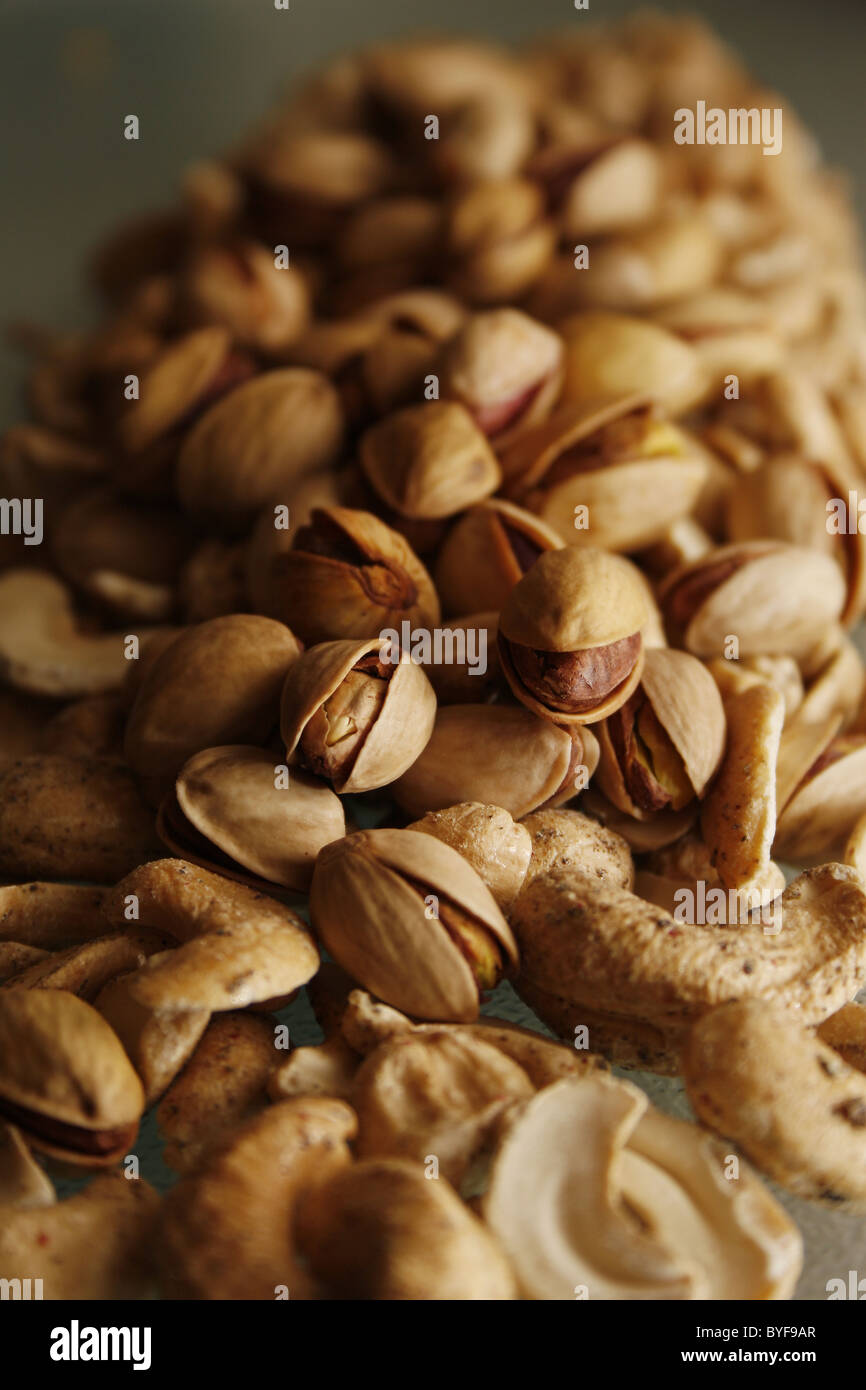 close up of pistachios and cashews Stock Photo
