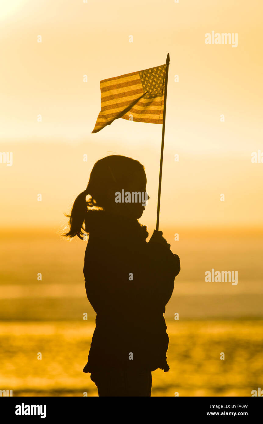 Young Girl Holding US Flag Stock Photo - Alamy