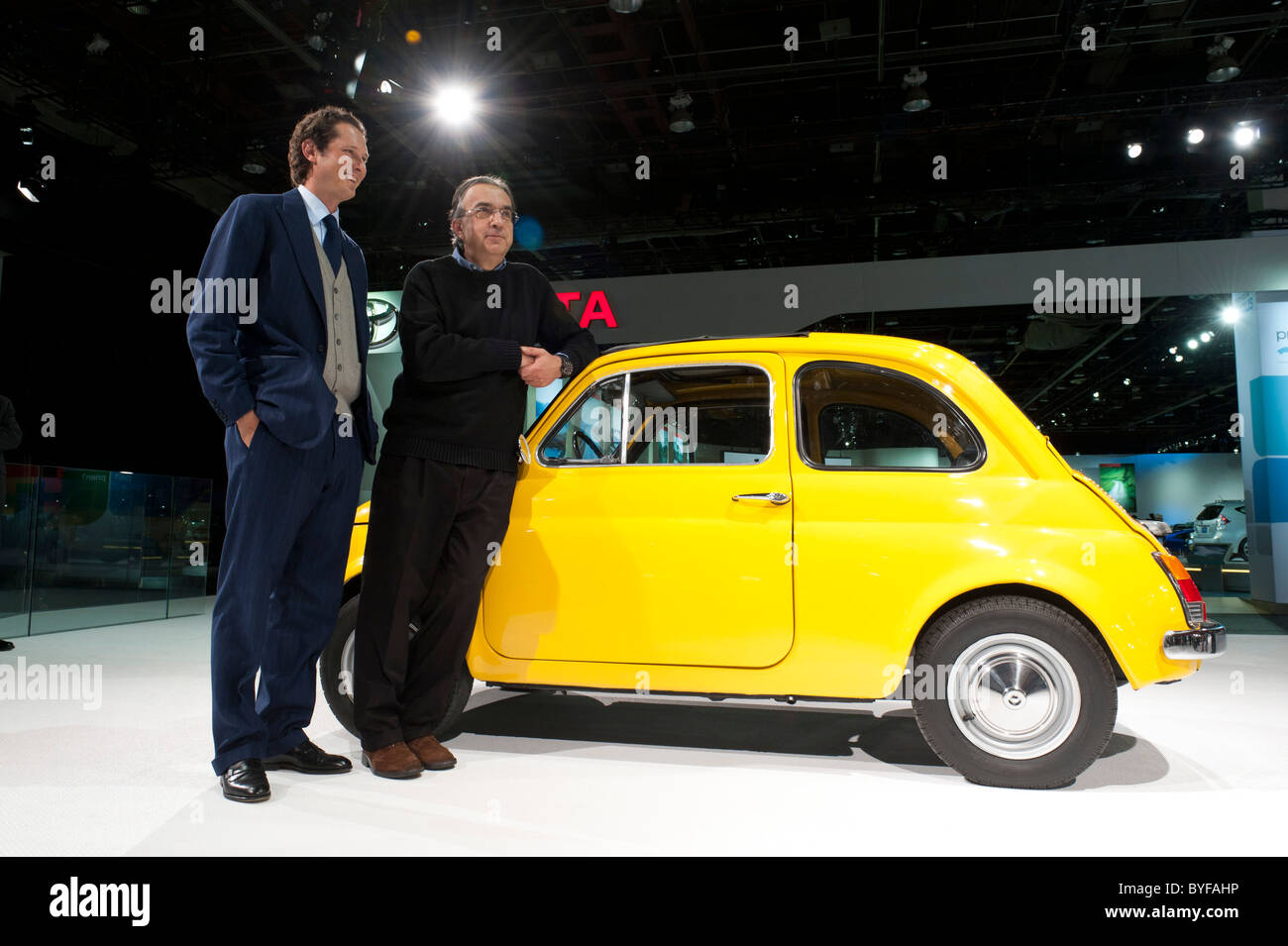 Fiat Chairman John Elkann and Fiat and  Chrysler CEO Sergio Marchionne with a vintage Fiat 500 at NAIAS 2011 in Detroit Stock Photo