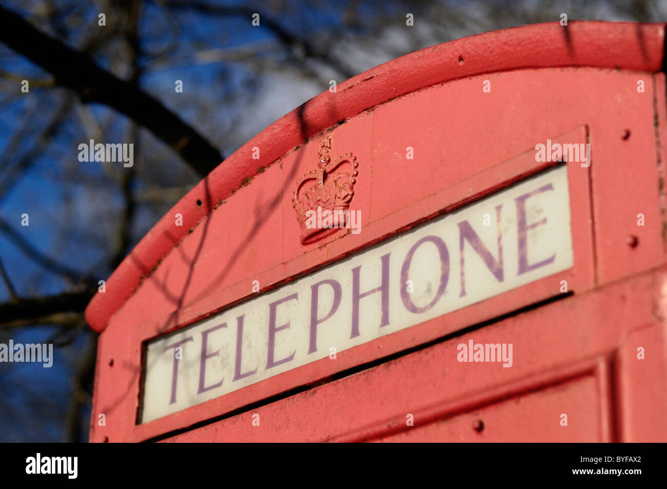 Traditional red phone box in English countryside. Stock Photo