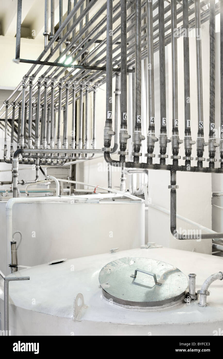 a line of containers for production of alcohol drinks Stock Photo Alamy