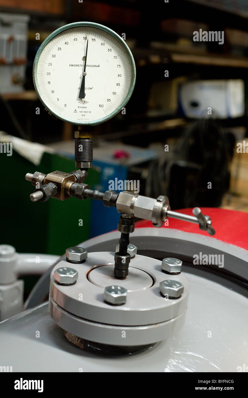 Pressure measurement in capacity by means of a manometre Stock Photo ...