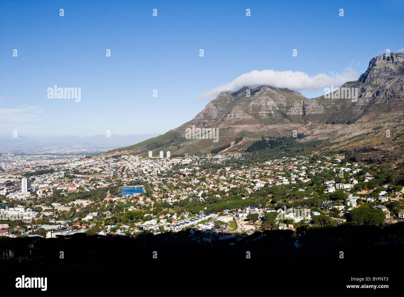 View of city with mountain in background Stock Photo